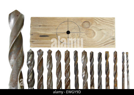 leader group of vintage rusted drill bits metal wood on white background Stock Photo