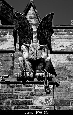 Gargoyle above the front entrance to Eastern State Penitentiary, Philadelphia Pennsylvania Stock Photo