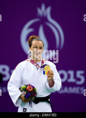 Baku, Azerbaijan. 25th June, 2015. Chitu Andrea of Romania displays her gold medal during the awarding ceremony for the women's 52kg Judo competition at the European Games in Baku, Azerbaijan, June 25, 2015. Chitu Andrea claimed the title of the event. Credit:  Tofik Babayev/Xinhua/Alamy Live News Stock Photo