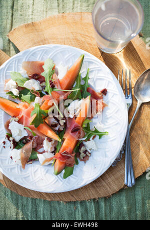 Cantaloupe salad with mozzarella and rucola Stock Photo