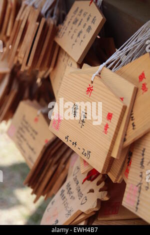 Ema, Japanese Prayer Tablet. Small wooden plaques onto which worshippers write wishes or prayers. Stock Photo