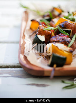 Skewers with halloumi, meat and tomato Stock Photo