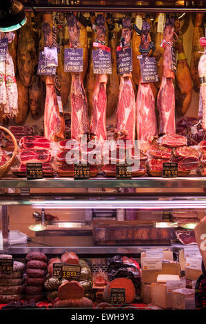 LA BOQUERIA MARKET. Iberico Ham 'Jamon' for sale on market stall at the famous site. Catalonia Barcelona Spain Stock Photo