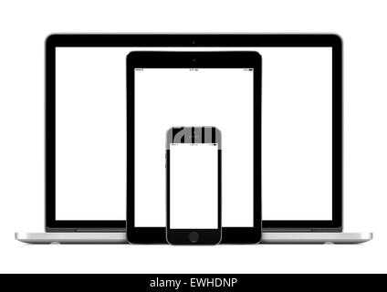 Set of modern tech gadgets template for adaptive web design presentation. Consist of laptop, smartphone and digital tablet pc. Stock Photo