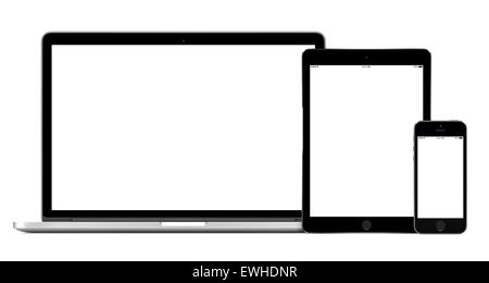 Set of modern gadgets includes laptop, digital tablet and smartphone mockup with empty white screen Stock Photo