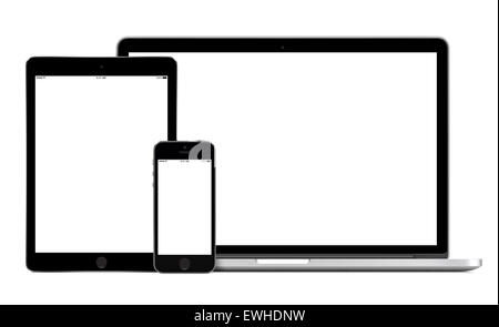 Open laptop, smartphone and tablet pc template for responsive design presentation. All gadgets in full focus. High quality. Stock Photo