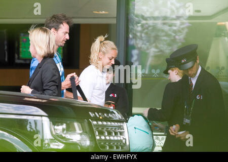 Wimbledon London, UK. 26th June 2015.  2013 Wimbledon ladies finalist Sabine Lisicki ( Ger) has  her bags tagged and checked by members of G4S security team at the entrance to AELTC Credit:  amer ghazzal/Alamy Live News Stock Photo