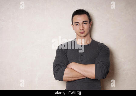 man with crossed arms Stock Photo