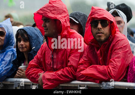 Glastonbury, Somerset, UK. 26th June, 2015. Scenes from Glastonbury Festival 2015 during the first downpour of rain. England, UK Credit:  Francesca Moore/Brighton SOURCE/Alamy Live News Stock Photo