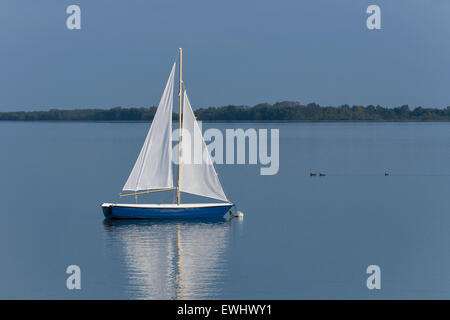 Sunset Dubrava lake reservoir landscape with sail boat in Prelog, Croatia. Stock Photo