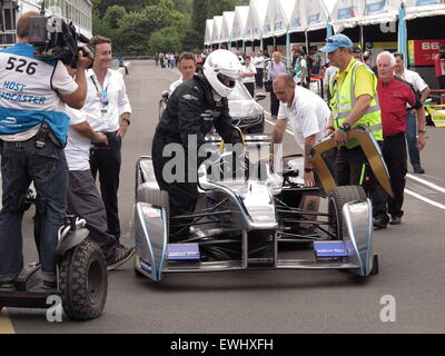 Battersea Park, London, UK. 26th June, 2015. Mayor Boris Johnson tries out a Formula E race car prior to the last two rounds to be held in Battersea Park, London tomorrow and Sunday (27th and 28th june 2015) Credit:  Motofoto/Alamy Live News Stock Photo