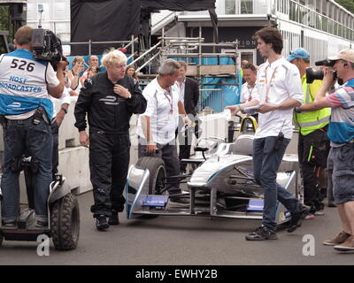 Battersea Park, London, UK. 26th June, 2015. Mayor Boris Johnson tries out a Formula E race car prior to the last two rounds to be held in Battersea Park, London tomorrow and Sunday (27th and 28th june 2015) Credit:  Motofoto/Alamy Live News Stock Photo