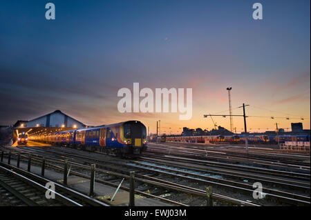 Dusk at Clapham Junction railway station Stock Photo