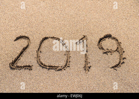 Year 2019 Written On Beach Sand Stock Photo
