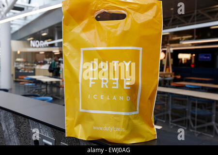 duty free shopping bag at Keflavik airport departures area terminal building Iceland Stock Photo