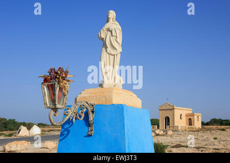 Statue of Madonna near the Chapel of the Immaculate Virgin at the Madonna Cliffs (Rdum Tal-Madonna) in Mellieha, Malta Stock Photo