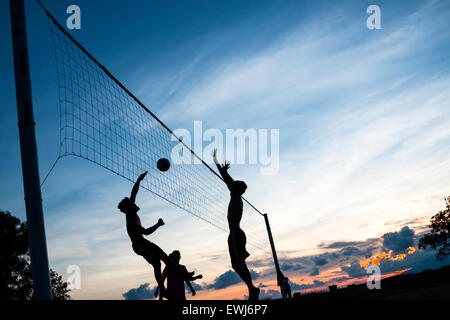 Volleyball game on the beach. Stock Photo