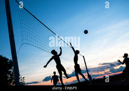 Volleyball game on the beach. Stock Photo