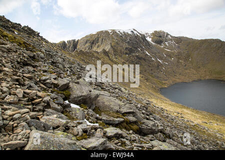 Striding Edge arete Helvellyn mountain peak and Red Tarn corrie lake, Lake District, Cumbria, England, UK Stock Photo