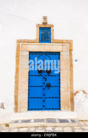 Sidi Bou Said - Beautiful ornamental blue door of so typical shape for Tunisia Stock Photo