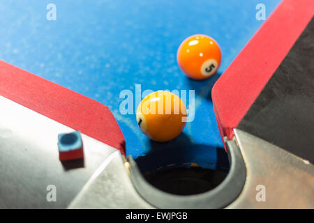 Ball near corner pocket of a pool table Stock Photo