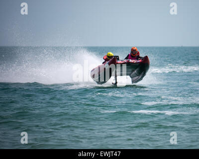 Portsmouth, England, june 27th 2015. An Inflatable  Catamaran gains some air as it races across the Solent during the Thundercat racing series in Southsea, Portsmouth. The ThunderCat series consists of 22 teams, racing powered inflatable catamarans in a variety of locations around the UK and Europe. Credit:  simon evans/Alamy Live News Stock Photo