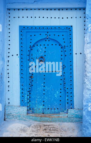 Blue painted door in old medina of Chefchaouen, Morocco, Africa Stock Photo