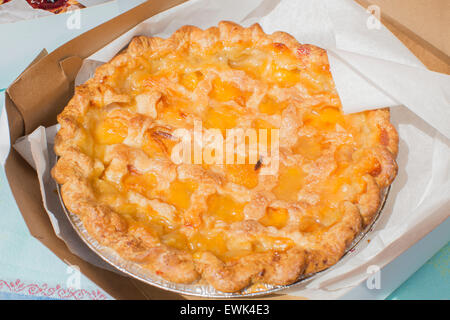 Fresh peach pie with lattice crust at Sebastopol farmer's market, Sonoma County, California Stock Photo