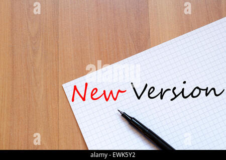 White blank notepad on office wooden table and text concept Stock Photo