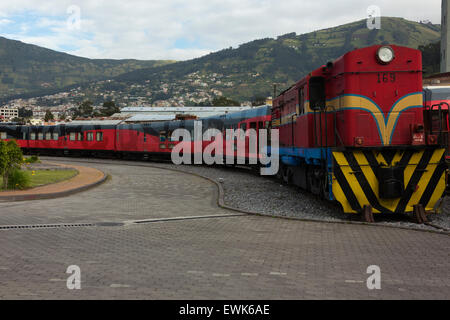 Train waiting in Cimbacalle train station Stock Photo