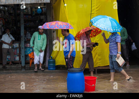 Dhaka, Bangladesh. 27th June, 2015. Waterlogged streets during rain  in Dhaka on 27th June 2015.Heavy raining in the city continued for a four consecutive day, inflicting endless suffering on the people as water logging hampered educational and business activities. Credit:  zakir hossain chowdhury zakir/Alamy Live News Stock Photo