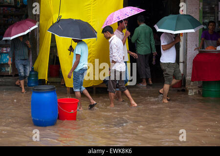 Dhaka, Bangladesh. 27th June, 2015. Waterlogged streets during rain  in Dhaka on 27th June 2015.Heavy raining in the city continued for a four consecutive day, inflicting endless suffering on the people as water logging hampered educational and business activities. Credit:  zakir hossain chowdhury zakir/Alamy Live News Stock Photo