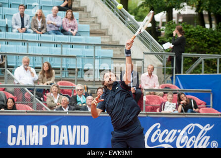 Berlin, Germany. 27th June, 2015. Former French tennis player Henri Leconte plays against his German opponent M. Stich at the Grand Champions Tournament in Berlin, Germany, 27 June 2015. Photo: OLIVER MEHLIS/dpa/Alamy Live News Stock Photo