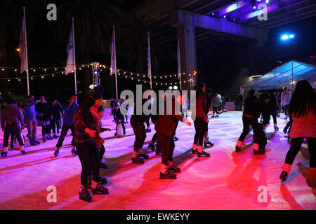 Sydney, Australia. 27 June 2015. The Cool Yule festival brings the winter atmosphere to Sydney with ice-skating, frozen forest, snow pit and more. Pictured: Ice rink. Credit:  Richard Milnes/Alamy Live News Stock Photo