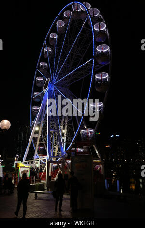 Sydney, Australia. 27 June 2015. The Cool Yule festival brings the winter atmosphere to Sydney with ice-skating, frozen forest, snow pit and more. Pictured: Ferris wheel. Credit:  Richard Milnes/Alamy Live News Stock Photo