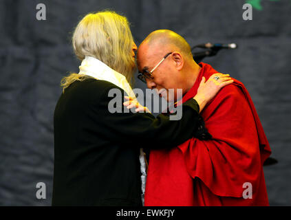 Glastonbury, UK. 28th June, 2015.   Patti Smith welcomes the 14th Dalmi Lama onto the Pyramid Stage during her performance at the 2015 Glastonbury Festival. Credit:  Apex/Alamy Live News Stock Photo