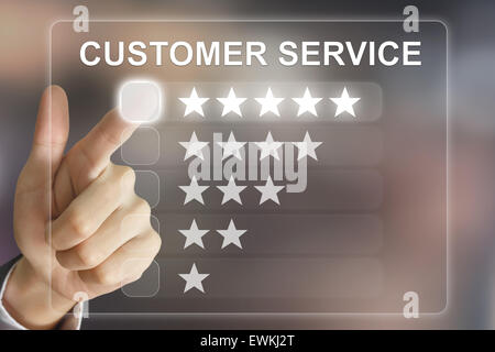 business hand clicking customer service on virtual screen interface Stock Photo