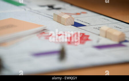 Berlin, Germany. 28th June, 2015. A view of the game board during the finals at the German Monopoly Championships, at which 24 players fight for the crown, in Berlin, Germany, 28 June 2015. Photo: TIM BRAKEMEIER/dpa/Alamy Live News