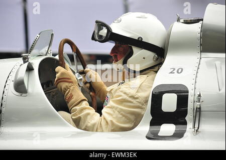 Pink Floyd drummer Nick Mason sits in an Auto Union at the Goodwood Festival of Speed. Racing drivers, celebrities and thousands of members of the public attended the Goodwood Festival of Speed to see modern and old racing cars and bikes in action. Stock Photo