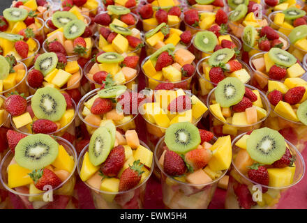 Fruit Cocktails on sale at market stall in Brick Lane London Stock Photo