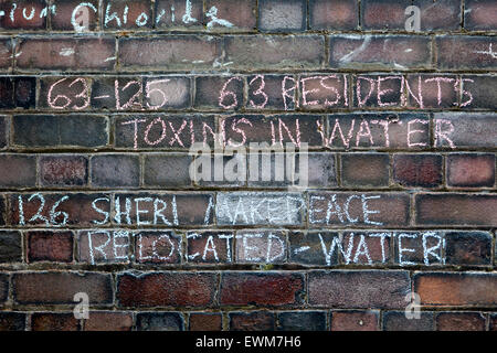 Memorial Wall listing the dead, injured & sick suffering from maladies alleged to be attributable to gas extraction worldwide. Stock Photo