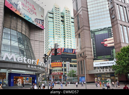 Visitors at Nanjing Road. Main shopping street of Shanghai. One of the busiest shopping streets in the world .  East Nanjing Roa Stock Photo