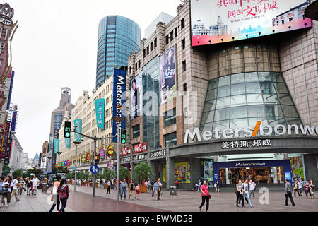 Visitors at Nanjing Road. Main shopping street of Shanghai. One of the busiest shopping streets in the world .  East Nanjing Roa Stock Photo