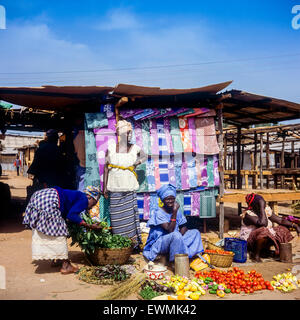 Vegetable and household linen merchants, Royal Albert market, Banjul, Gambia, West Africa Stock Photo