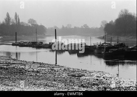 Boats on the River Thames in Kew, London. 5th March 1971.