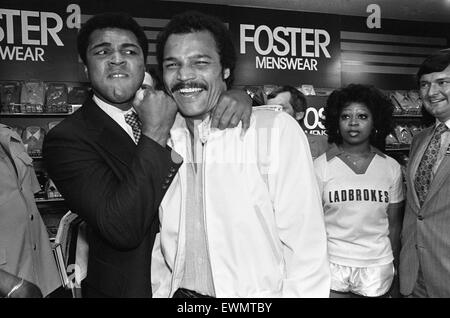 Muhammad Ali Visiting the Bull Ring Shopping Centre in Birmingham. Pictured here with John Conteh in Debenhams Department Store. 7th June 1979. Stock Photo