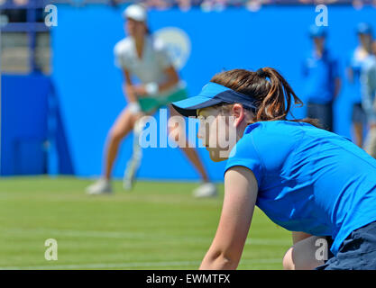 Ball girl at the Aegon International tournament at Eastbourne, 2015 (Johanna Konta behind) Stock Photo