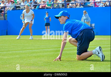 Ball boy and ball girl at the Aegon International tournament at Eastbourne, 2015 Stock Photo