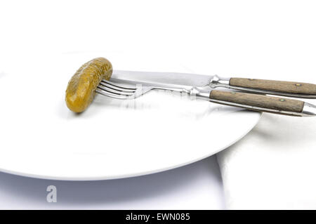Pickled gherkin on table Stock Photo
