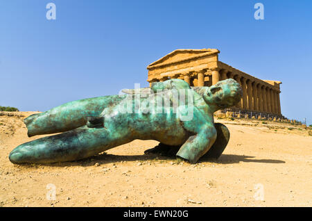 Icarus statue in front of Temple of Concordia at Agrigento Valley of the Temple, Sicily Stock Photo